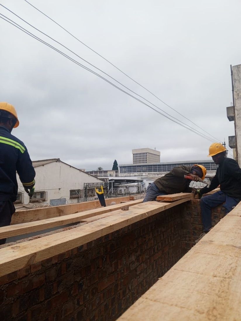BlickStone carpenters fixing a timber roof structure on a commercial building in central Bulawayo